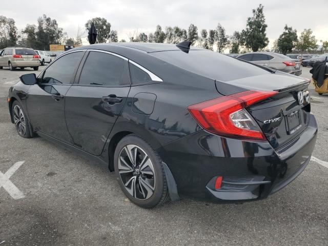 Photo 2 from auction – 2016 HONDA CIVIC EX with VIN 2HGFC1F39GH642121
