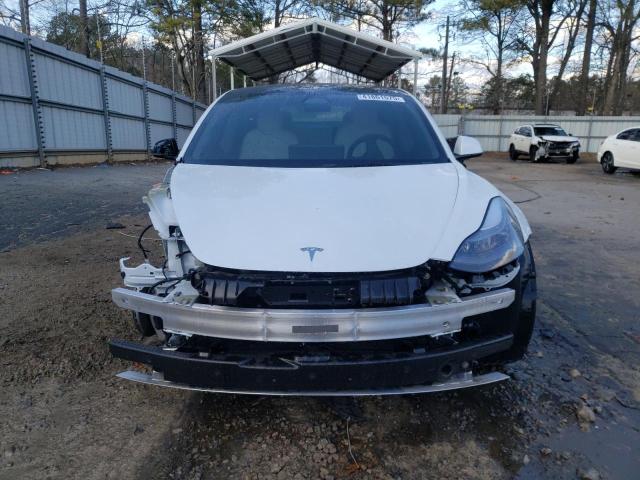 Photo 5 from auction – 2022 TESLA MODEL 3 with VIN 5YJ3E1EA1NF326758