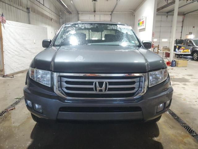 Photo 5 from auction – 2013 HONDA RIDGELINE with VIN 5FPYK1F59DB011387