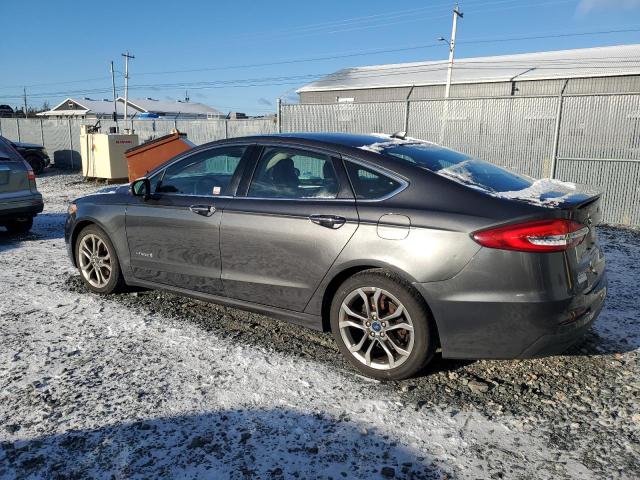 Photo 2 from auction – 2019 FORD FUSION TIT with VIN 3FA6P0RU9KR243889