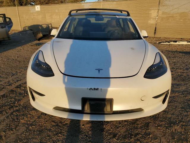 Photo 5 from auction – 2021 TESLA MODEL 3 with VIN 5YJ3E1EAXMF867354