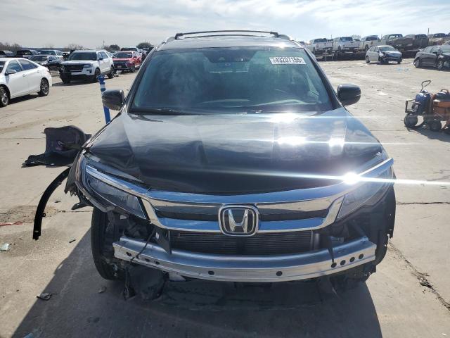 Photo 5 from auction – 2022 HONDA PILOT TOUR with VIN 5FNYF5H64NB003094