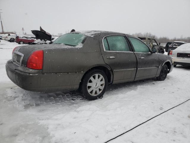 Photo 3 from auction – 2004 LINCOLN TOWN CAR U with VIN 1LNHM83W74Y631434