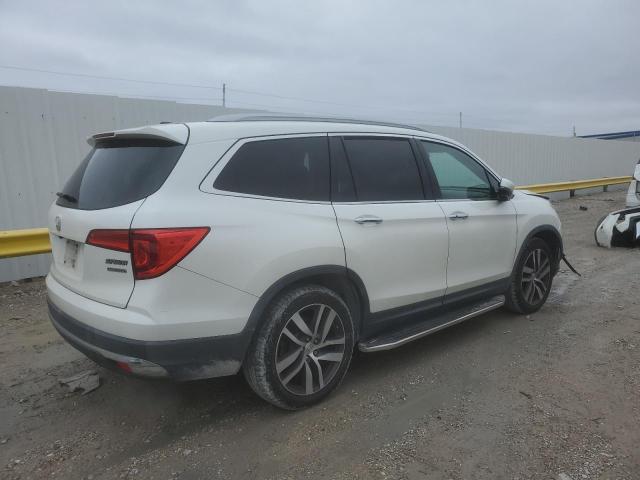 Photo 3 from auction – 2018 HONDA PILOT TOUR with VIN 5FNYF5H9XJB030191