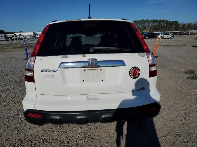 Photo 6 from auction – 2009 HONDA CRV with VIN 5J6RE38789L012933