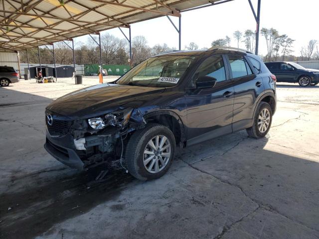 MAZDA CX-5 SPORT 2014 with VIN JM3KE2BE9E0428551 - Photo from auction