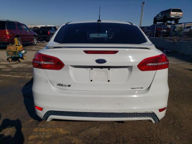 Photo 6 from auction – 2015 FORD FOCUS SE with VIN 1FADP3F22FL357586