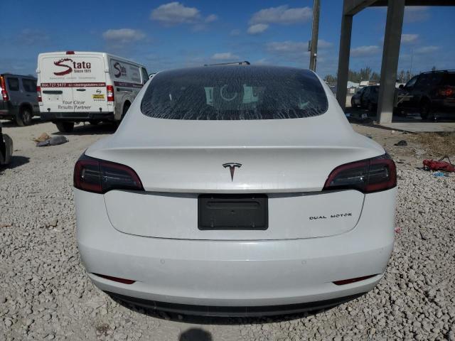 Photo 6 from auction – 2022 TESLA MODEL 3 with VIN 5YJ3E1EB4NF104241