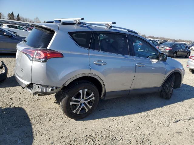 Photo 3 from auction – 2018 TOYOTA RAV4 LE with VIN 2T3BFREV1JW758460