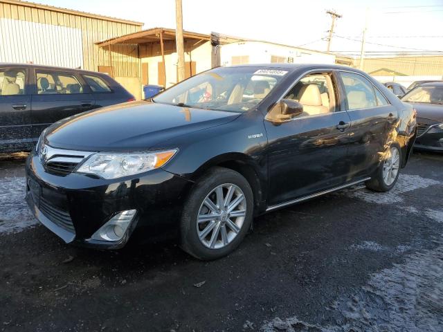 TOYOTA CAMRY HYBR 2012 with VIN 4T1BD1FKXCU007252 - Photo from auction