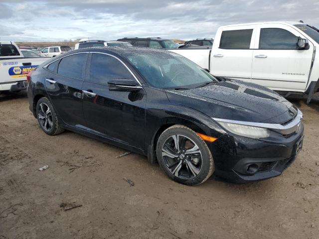 Photo 4 from auction – 2016 HONDA CIVIC TOUR with VIN 2HGFC1F97GH652330