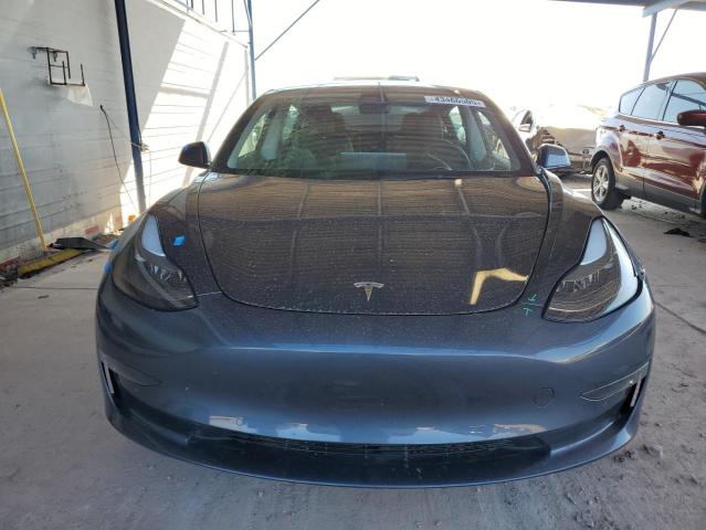 Photo 5 from auction – 2022 TESLA MODEL 3 with VIN 5YJ3E1EB9NF341128