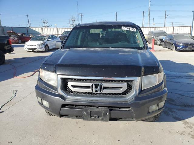 Photo 5 from auction – 2010 HONDA RIDGELINE with VIN 5FPYK1F51AB002145