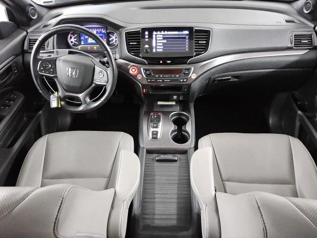 Photo 8 from auction – 2023 HONDA PASSPORT E with VIN 5FNYF8H57PB012769