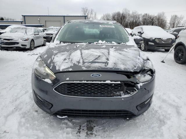 Photo 5 from auction – 2017 FORD FOCUS SEL with VIN 1FADP3H23HL238588