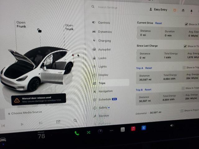 Photo 9 from auction – 2023 TESLA MODEL Y with VIN 7SAYGAEE4PF599993