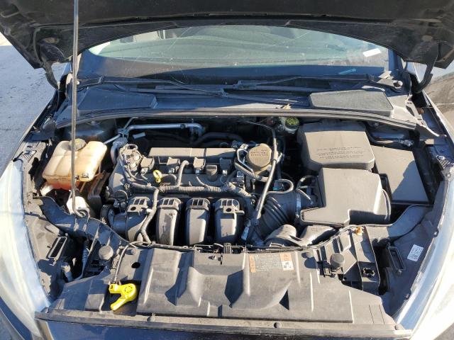 Photo 11 from auction – 2015 FORD FOCUS S with VIN 1FADP3E21FL300393