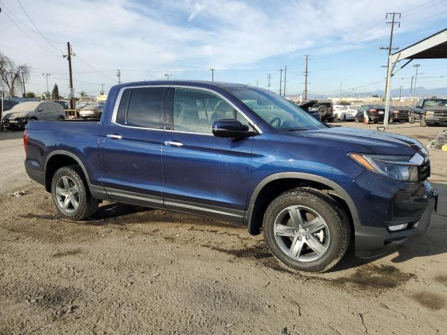 Снимка 4 от търг – 2023 HONDA RIDGELINE с VIN 5FPYK3F74PB039311