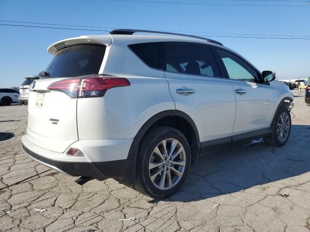 Photo 3 from auction – 2018 TOYOTA RAV4 LIMIT with VIN JTMDFREV2JD230285