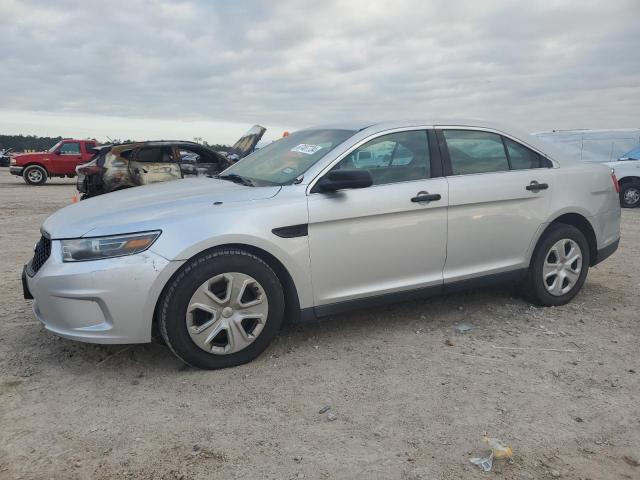 FORD TAURUS POL 2015 with VIN 1FAHP2MK2FG121446 - Photo from auction