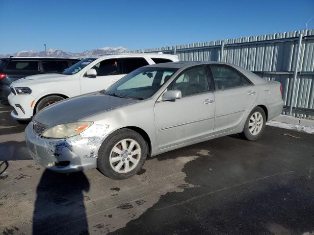 TOYOTA CAMRY LE 2003 with VIN 4T1BF30K63U055958 - Photo from auction