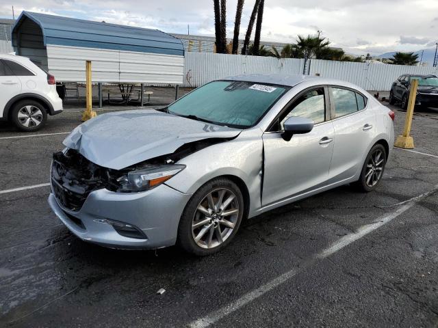 MAZDA 3 TOURING 2018 with VIN 3MZBN1V38JM217603 - Photo from auction