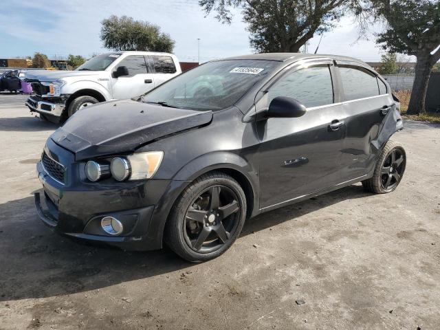 CHEVROLET SONIC 2013 with VIN 1G1JE5SB7D4149854 - Photo from auction