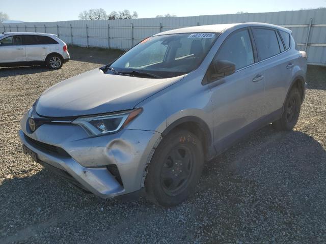 TOYOTA RAV4 LE 2018 with VIN 2T3BFREV8JW778219 - Photo from auction