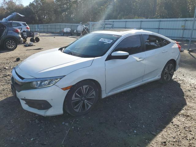 HONDA CIVIC EX 2016 with VIN 2HGFC1F3XGH649255 - Photo from auction