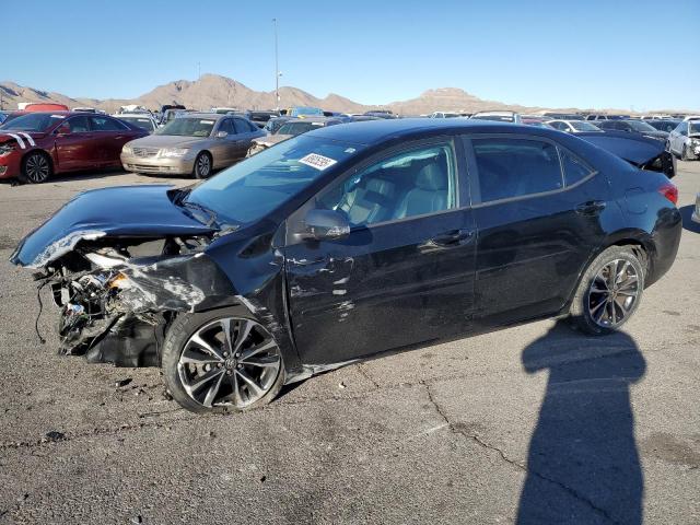TOYOTA COROLLA L 2017 with VIN 2T1BURHE6HC784140 - Photo from auction