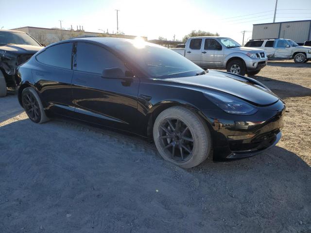 Photo 4 from auction – 2022 TESLA MODEL 3 with VIN 5YJ3E1EA0NF358424