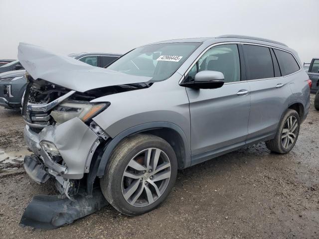 HONDA PILOT ELIT 2016 with VIN 5FNYF6H00GB087760 - Photo from auction