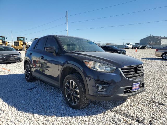 Photo 4 from auction – 2016 MAZDA CX-5 GT with VIN JM3KE2DY0G0669182