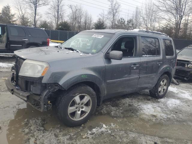 HONDA PILOT EXL 2011 with VIN 5FNYF3H52BB055136 - Photo from auction