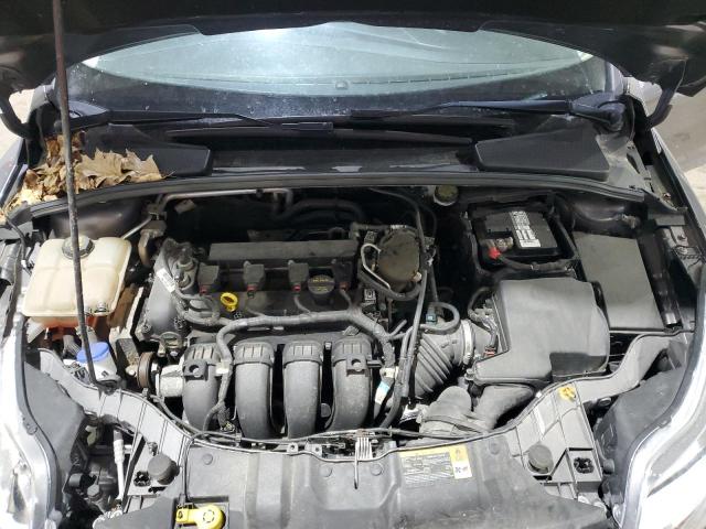 Photo 11 from auction – 2014 FORD FOCUS SE with VIN 1FADP3F27EL164395