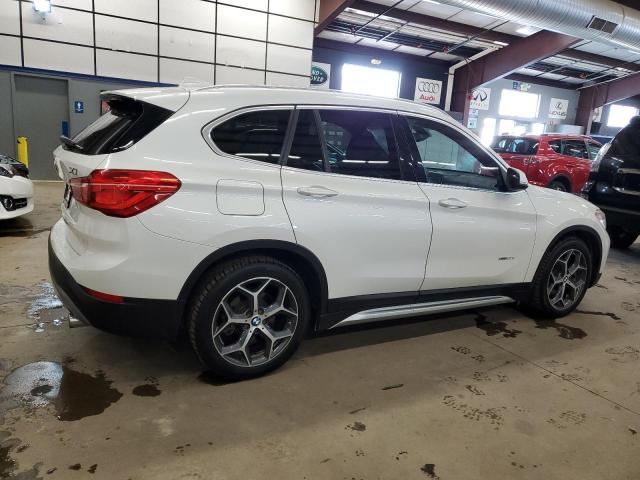 Photo 3 from auction – 2016 BMW X1 XDRIVE2 with VIN WBXHT3C34G5E55485