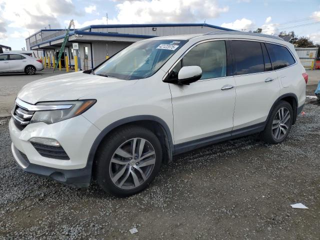 Photo 1 from auction – 2016 HONDA PILOT TOUR with VIN 5FNYF5H92GB030016