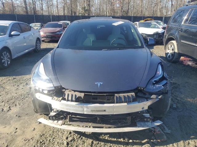 Photo 5 from auction – 2022 TESLA MODEL 3 with VIN 5YJ3E1ECXNF163299