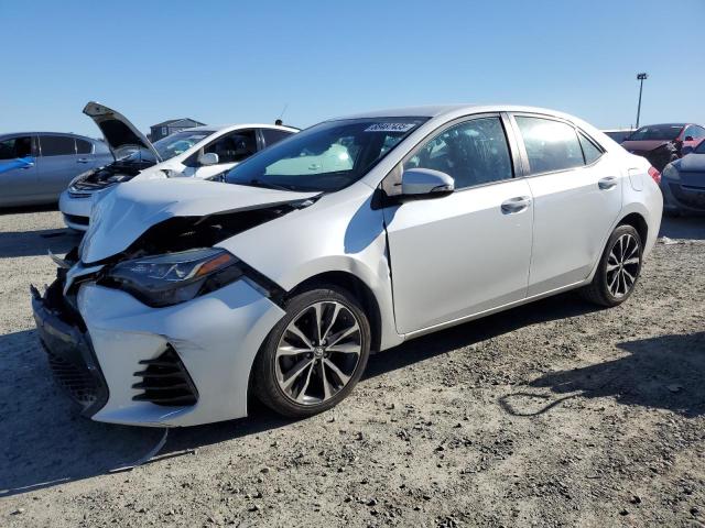 TOYOTA COROLLA L 2017 with VIN 5YFBURHE0HP704251 - Photo from auction