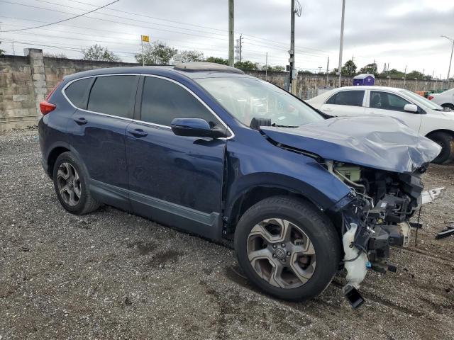 Photo 4 from auction – 2017 HONDA CR-V with VIN 5J6RW1H89HL009788