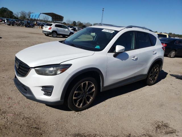 MAZDA CX-5 GT 2016 with VIN JM3KE2DY2G0714476 - Photo from auction