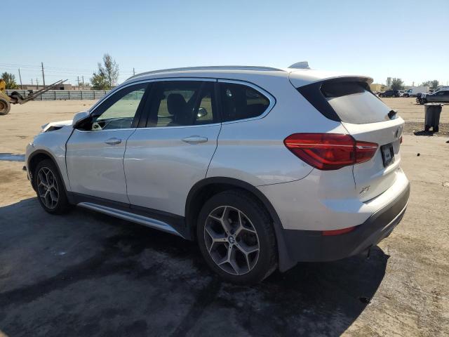 Photo 2 from auction – 2018 BMW X1 SDRIVE2 with VIN WBXHU7C35J3F04555