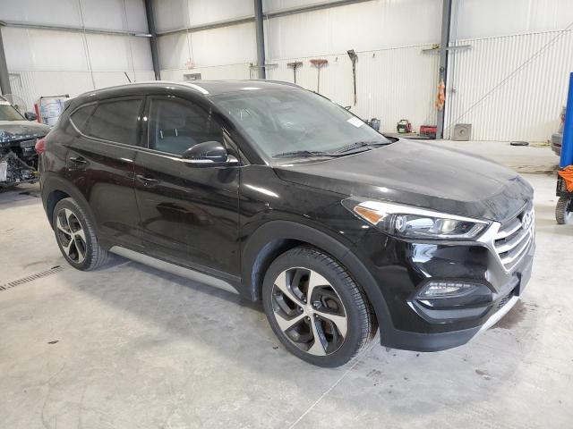 Photo 4 from auction – 2017 HYUNDAI TUCSON LIM with VIN KM8J3CA23HU374602