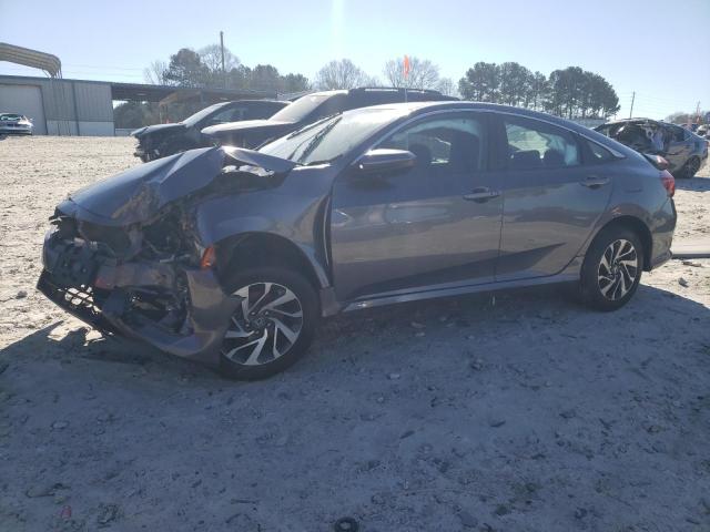 HONDA CIVIC EX 2017 with VIN 19XFC2F75HE205592 - Photo from auction