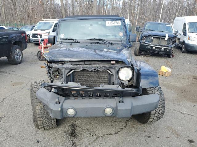 Zdjęcie 5 z aukcji – 2009 JEEP WRANGLER U z VIN 1J8GA59129L731862