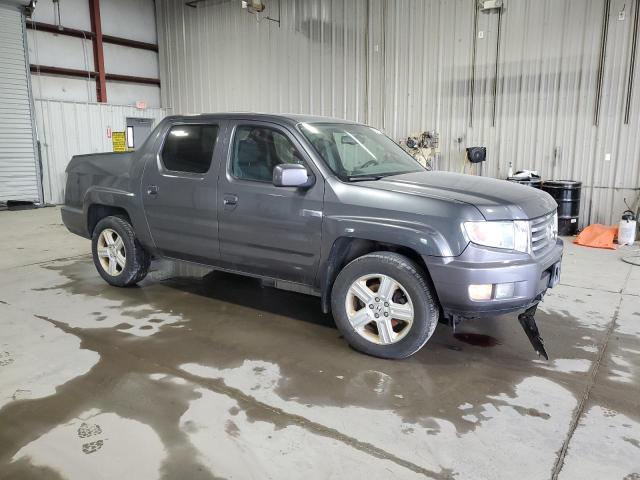 Photo 4 from auction – 2014 HONDA RIDGELINE with VIN 5FPYK1F53EB011791