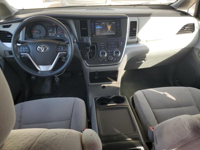 Photo 8 from auction – 2015 TOYOTA SIENNA LE with VIN 5TDKK3DCXFS690466