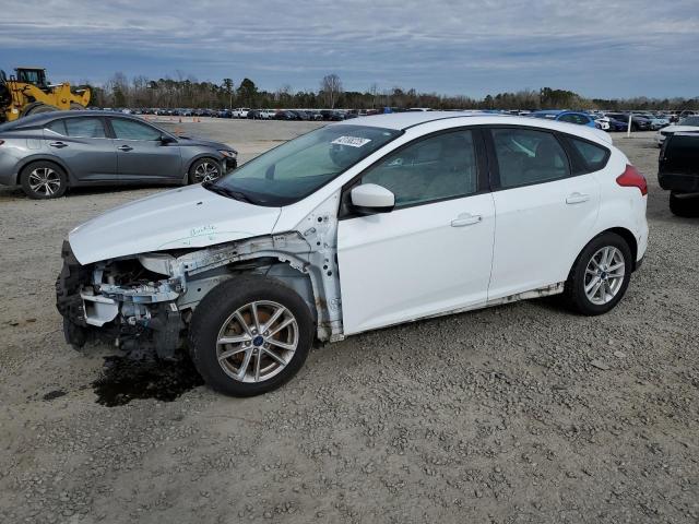 FORD FOCUS SE 2018 with VIN 1FADP3K28JL206590 - Photo from auction