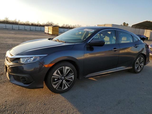 HONDA CIVIC EX 2016 with VIN 19XFC1F41GE208360 - Photo from auction