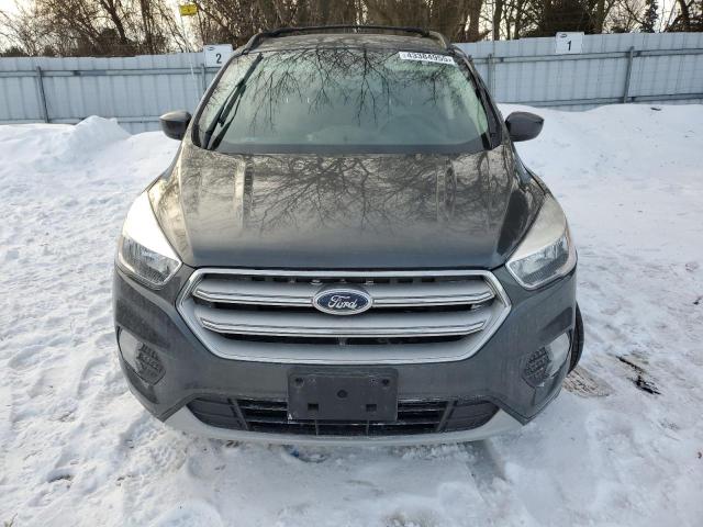 Photo 5 from auction – 2018 FORD ESCAPE SE with VIN 1FMCU0GD0JUD23948